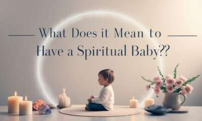 A serene room with a person surrounded by crystals, candles, and flowers, with the title "What Does It Mean to Have a Spiritual Baby?" displayed prominently, symbolizing spiritual growth and new beginnings.